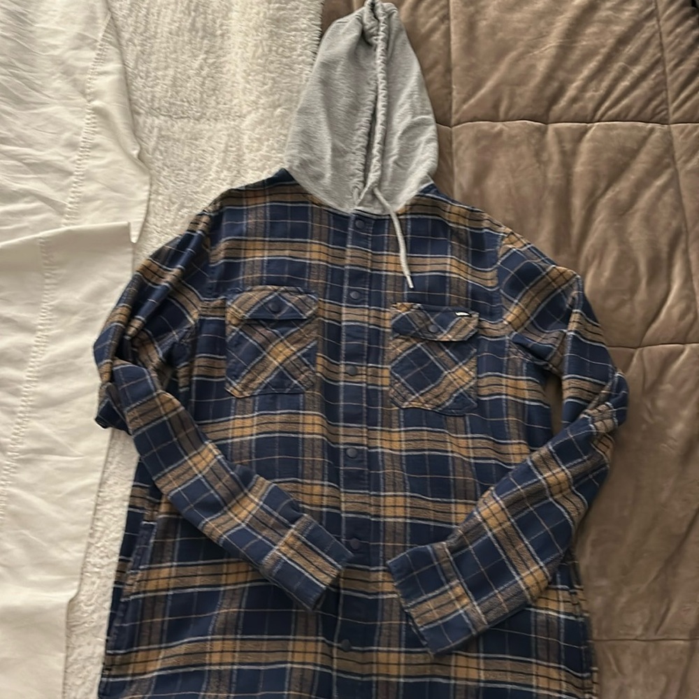 Vans flannel with hoody and pockets. Worn once size small